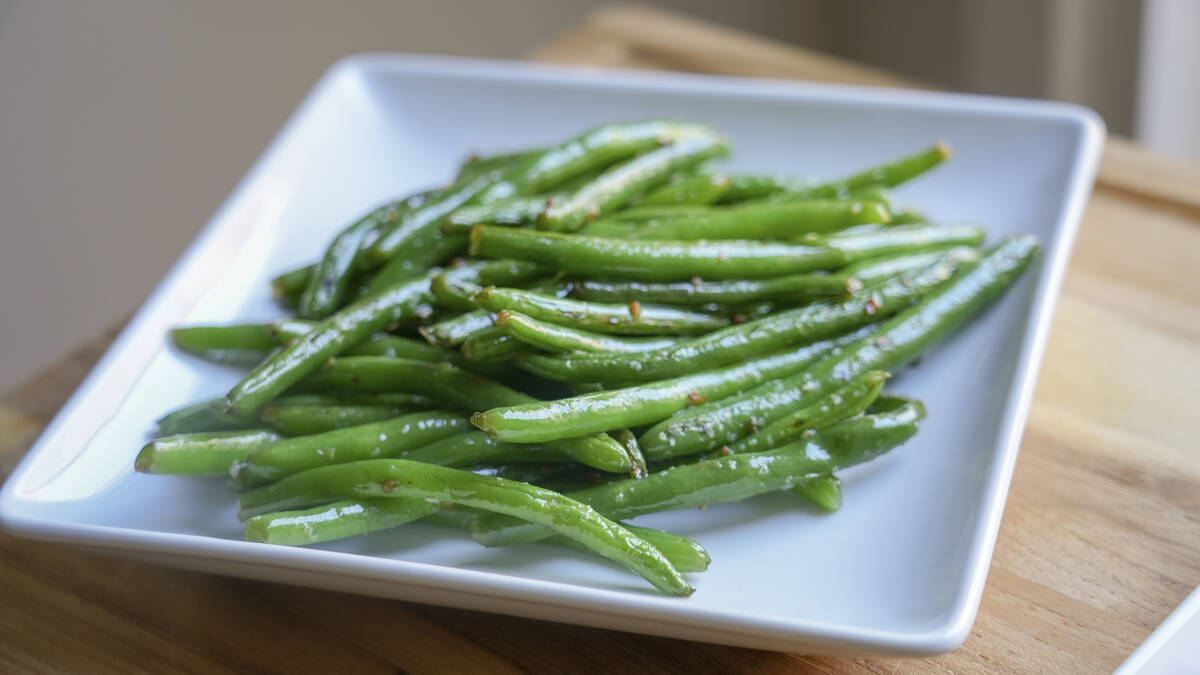 A plate of sauteed green beans is displayed in Lincoln, Neb., on Oct. 16, 2024. (Amber Pankonin ...