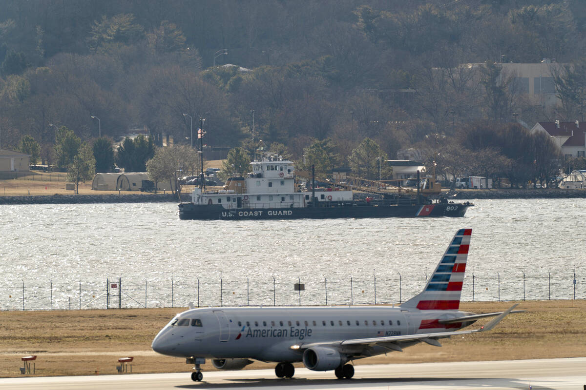 An American airline aircraft take off from Ronald Reagan Washington National Airport, as a Coas ...