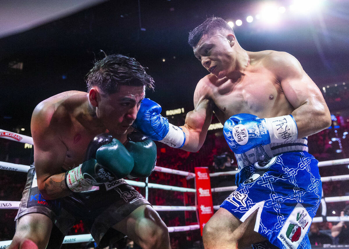 Angel Fierro takes punch to the side of the face from Isaac “Pitbull” Cruz during ...