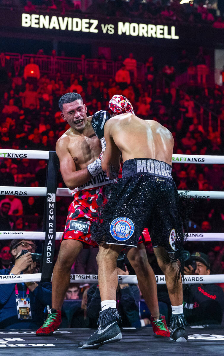 David Benavidez takes a shot to the side of the face by David Morrell Jr. in round 4 of their W ...