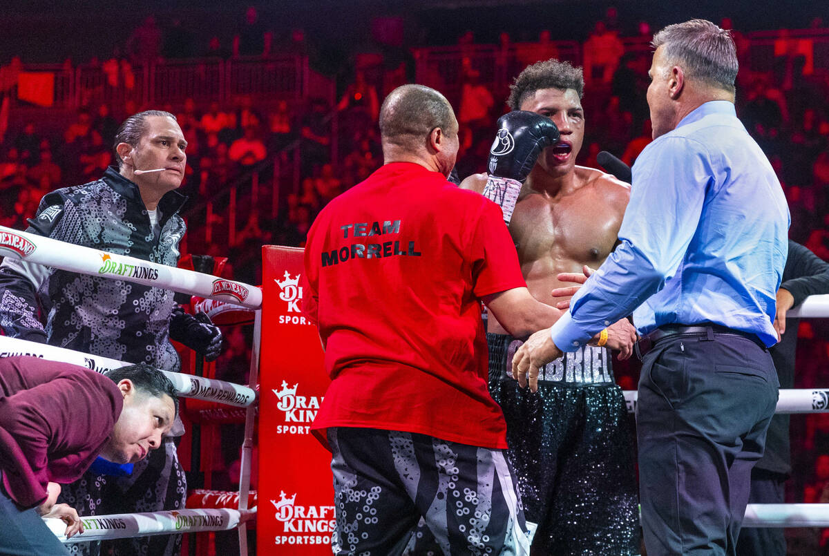 David Morrell Jr. is penalized a point for a late hit on David Benavidez in round 11 of their W ...
