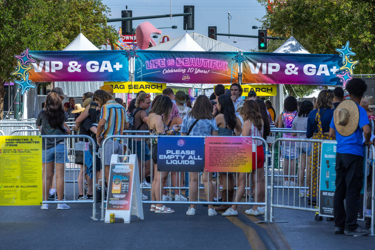 Life Is Beautiful attendees line up to enter from the VIP and GA+ entrance for the first night ...