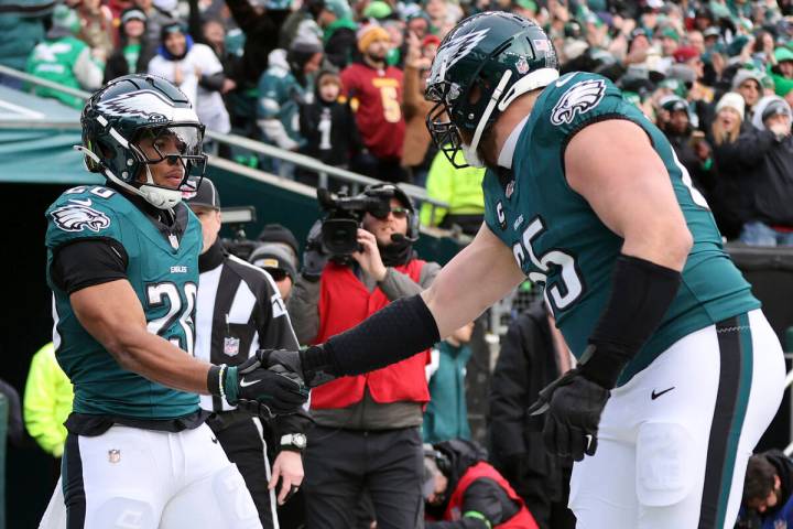 Philadelphia Eagles running back Saquon Barkley (26) celebrates with Philadelphia Eagles offens ...