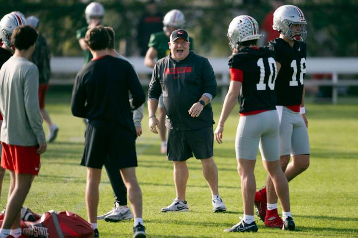 FILE - Ohio State offensive coordinator Chip Kelly laughs during practice in Carson, Calif., Mo ...