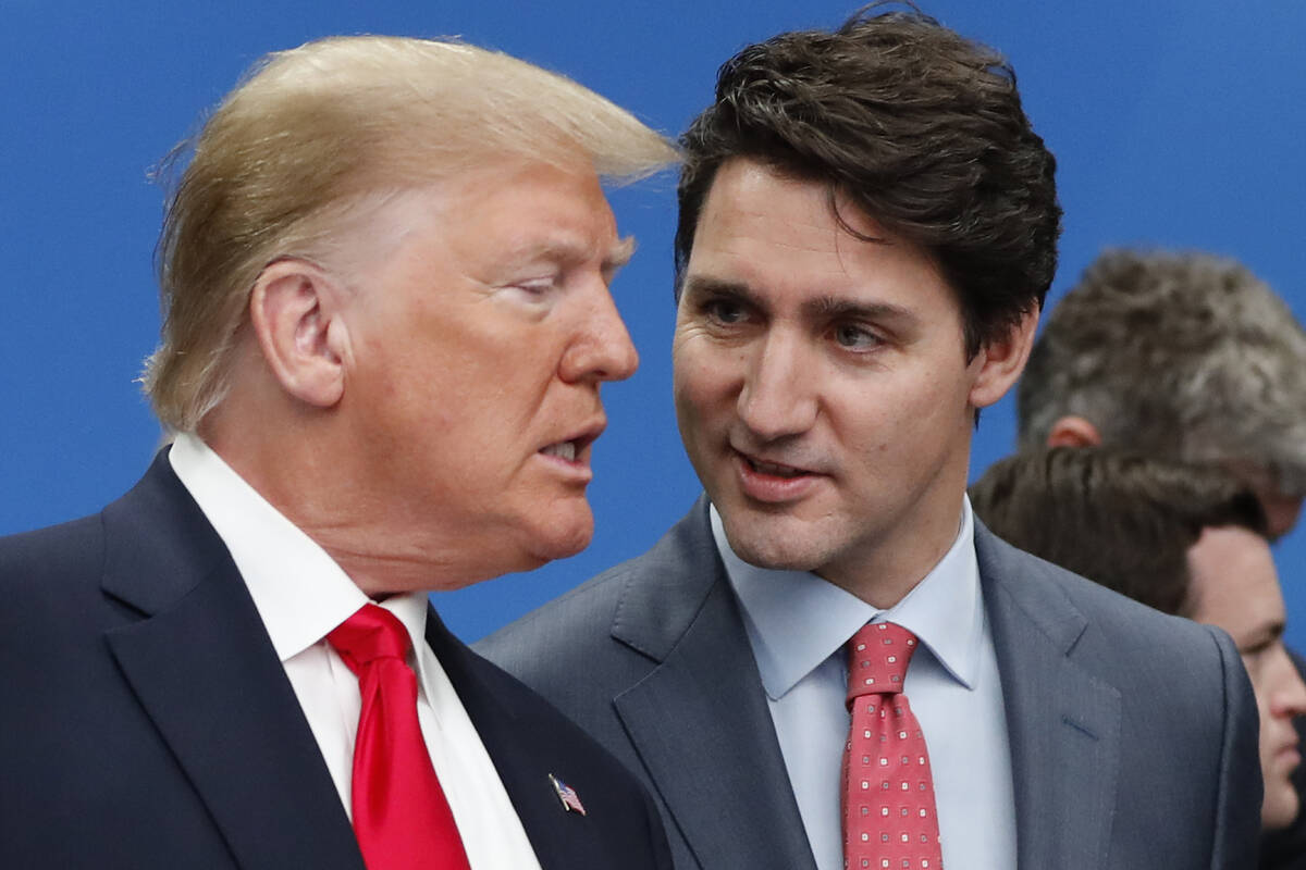 U.S. President Donald Trump, left, and Canadian Prime Minister Justin Trudeau talk prior to a N ...