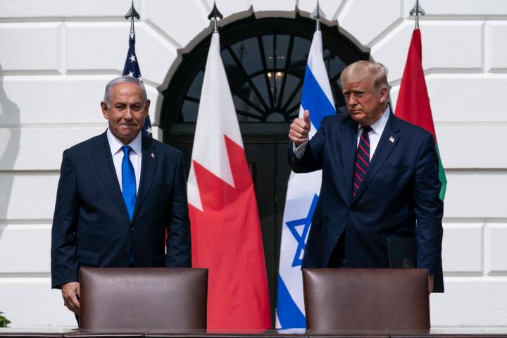 FILE- Israeli Prime Minister Benjamin Netanyahu, left, and President Donald Trump on the South ...