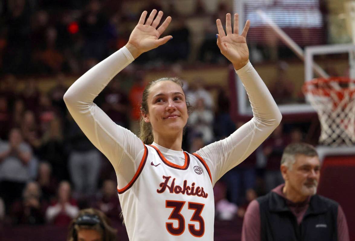 Virginia Tech's Elizabeth Kitley (33) waves to the crowd during a special senior day ceremony p ...