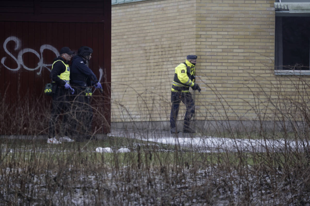 Police at the scene of an incident at Risbergska School, in Örebro, Sweden, Tuesday, Feb. ...