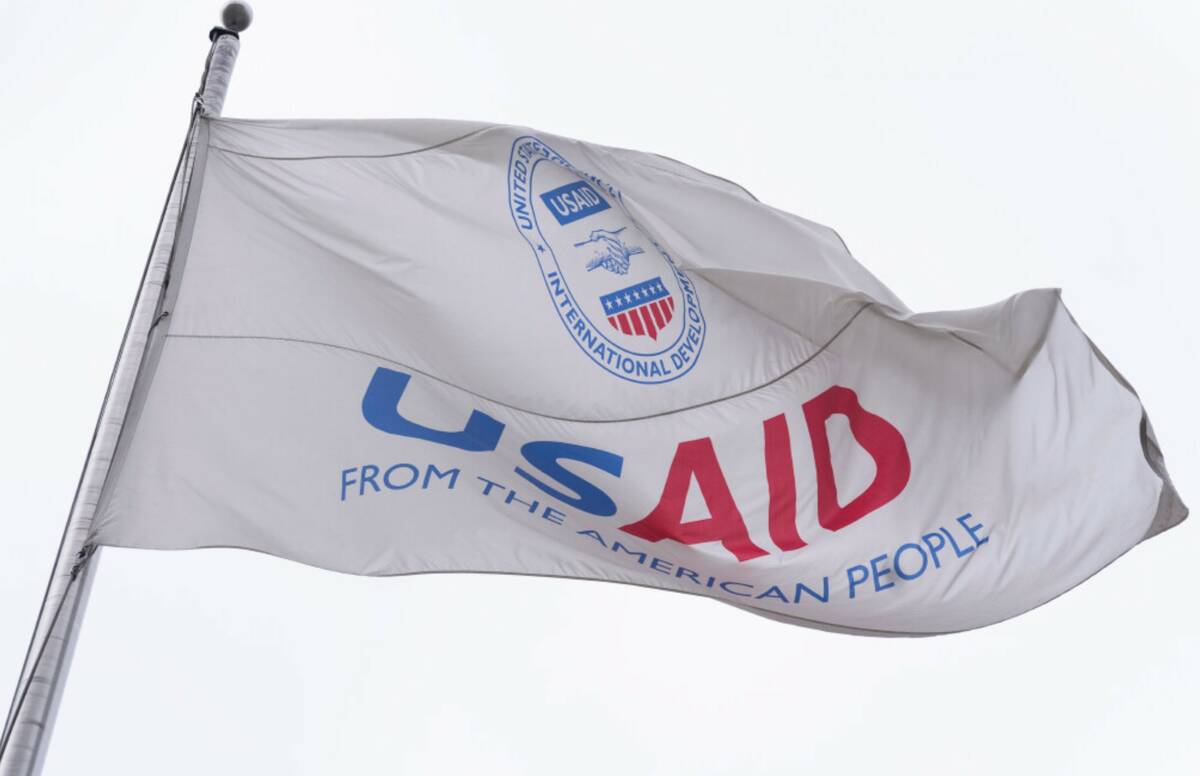 The flag of the United States Agency for International Development, or USAID, flies in front of ...