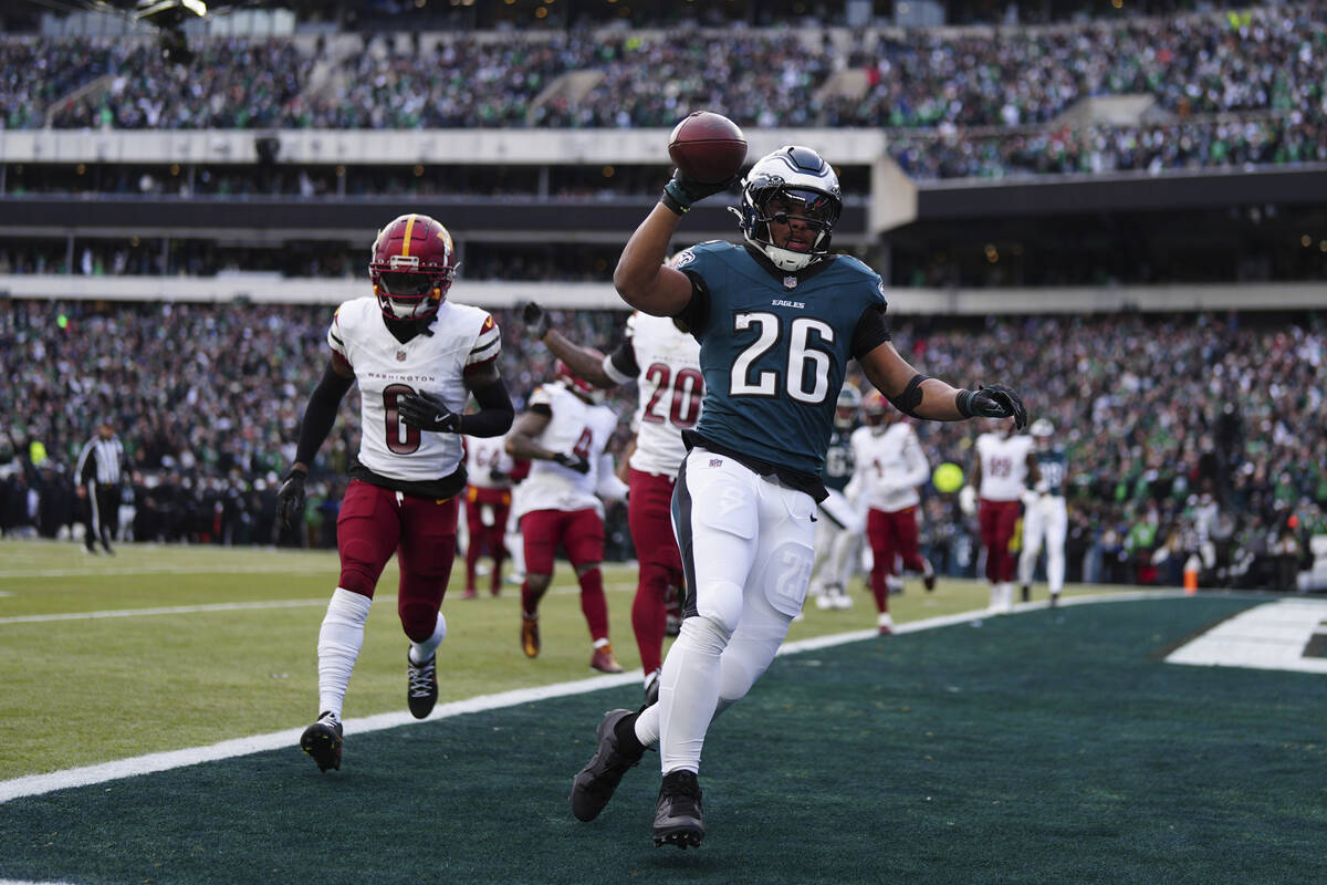 Philadelphia Eagles running back Saquon Barkley (26) scores a touchdown during the NFC Champion ...