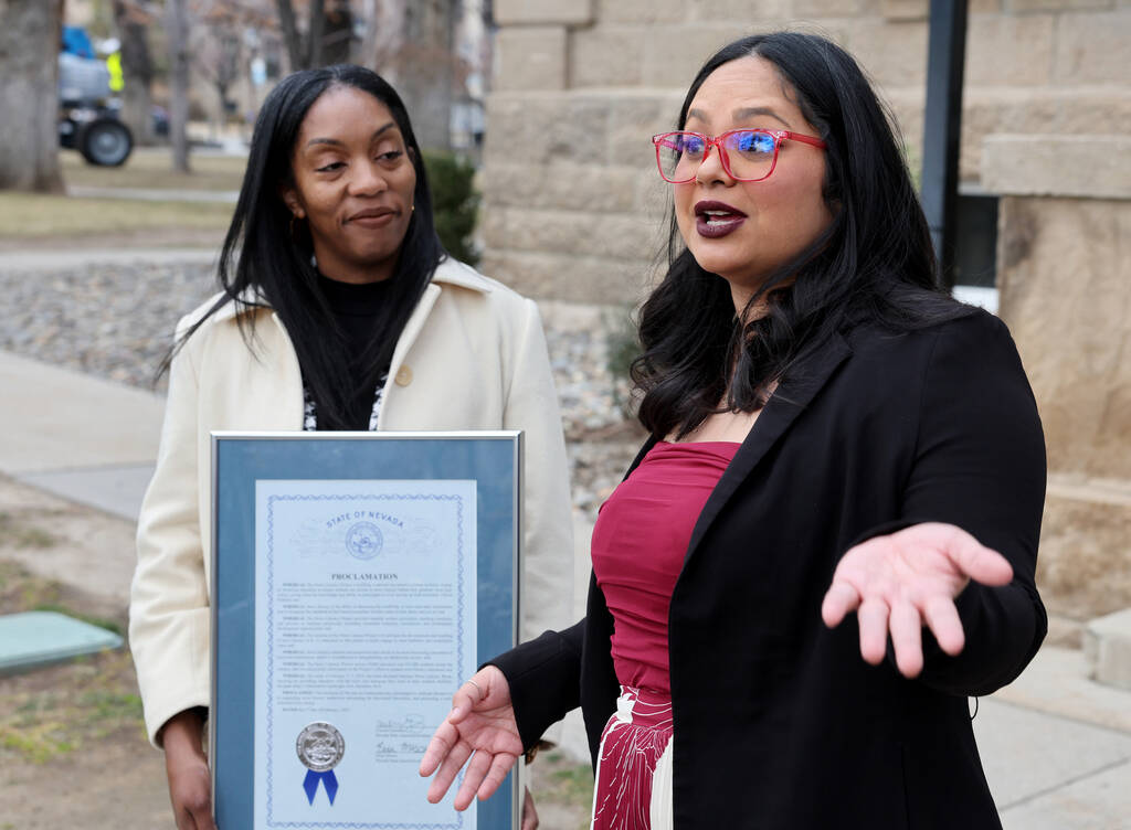 Assembly member Cecelia González, D-Las Vegas, right, speaks as Ebonee Otoo, senior vice p ...