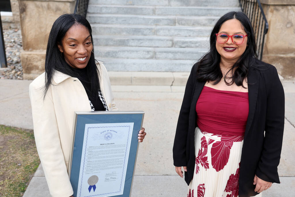 Ebonee Otoo, senior vice president of educator engagement at the News Literacy Project, left, s ...