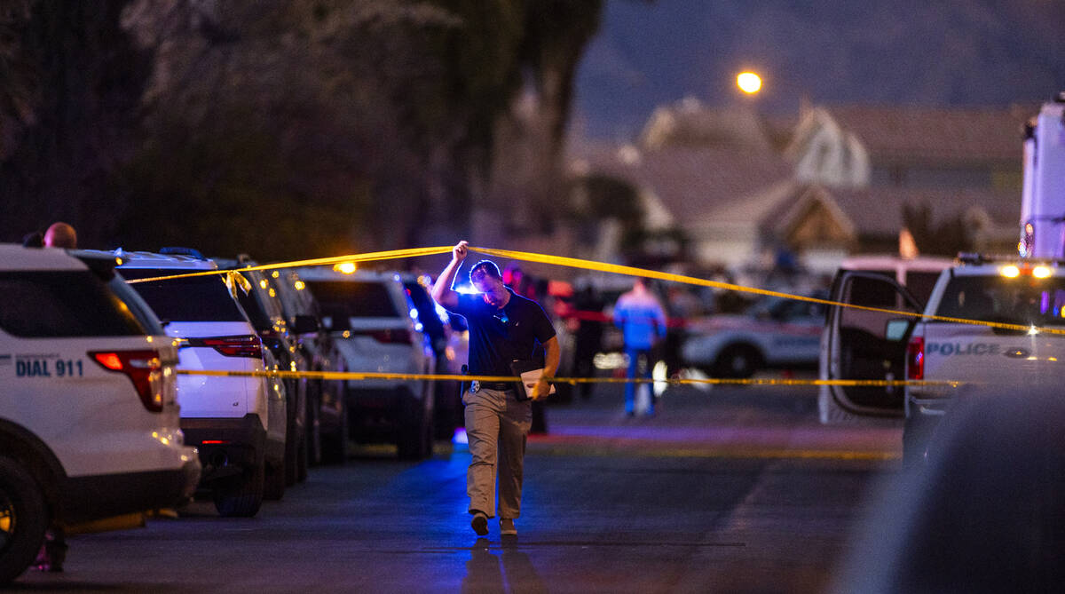 Personnel depart the scene of a North Las Vegas Police officer-involved shooting along the 4700 ...