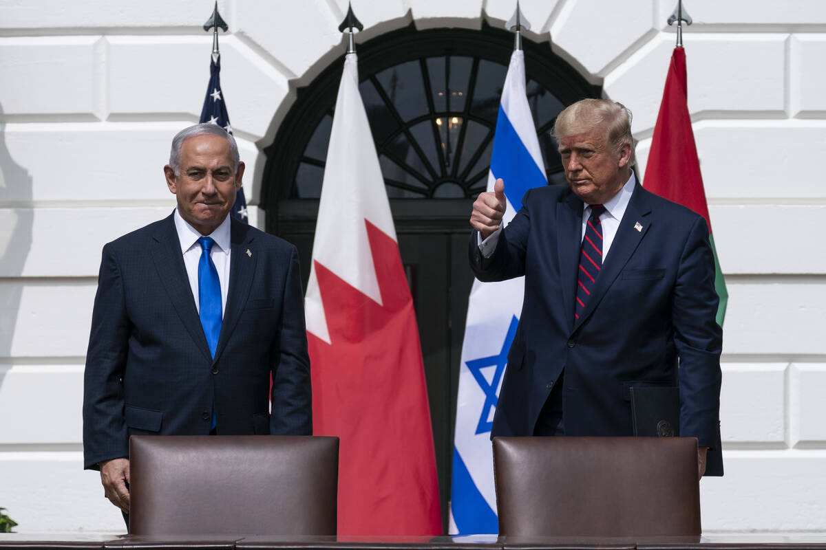Israeli Prime Minister Benjamin Netanyahu, left, and President Donald Trump stand as they prepa ...