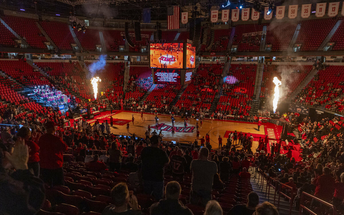 Flames erupt above the baskets as UNLV is introduced to play the Boise State Broncos in their N ...