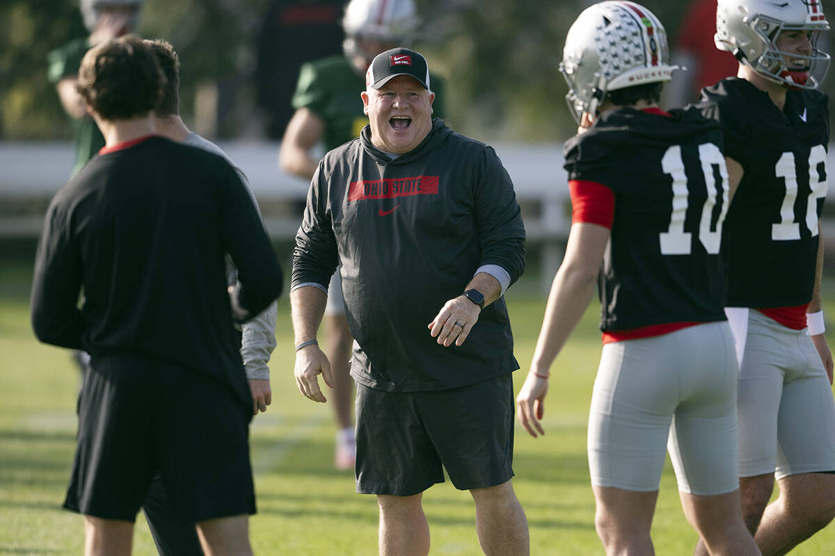 Ohio State offensive coordinator Chip Kelly laughs during practice in Carson, Calif., Monday, D ...