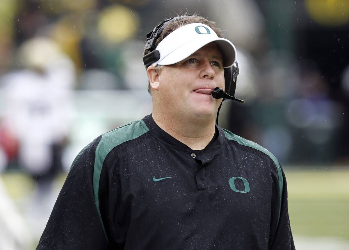 In this Oct. 27, 2012, file photo, Oregon football coach Chip Kelly watches the clock wind down ...
