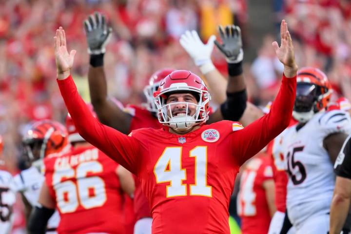 Kansas City Chiefs long snapper James Winchester (41) celebrates teammate Harrison Butker's fie ...