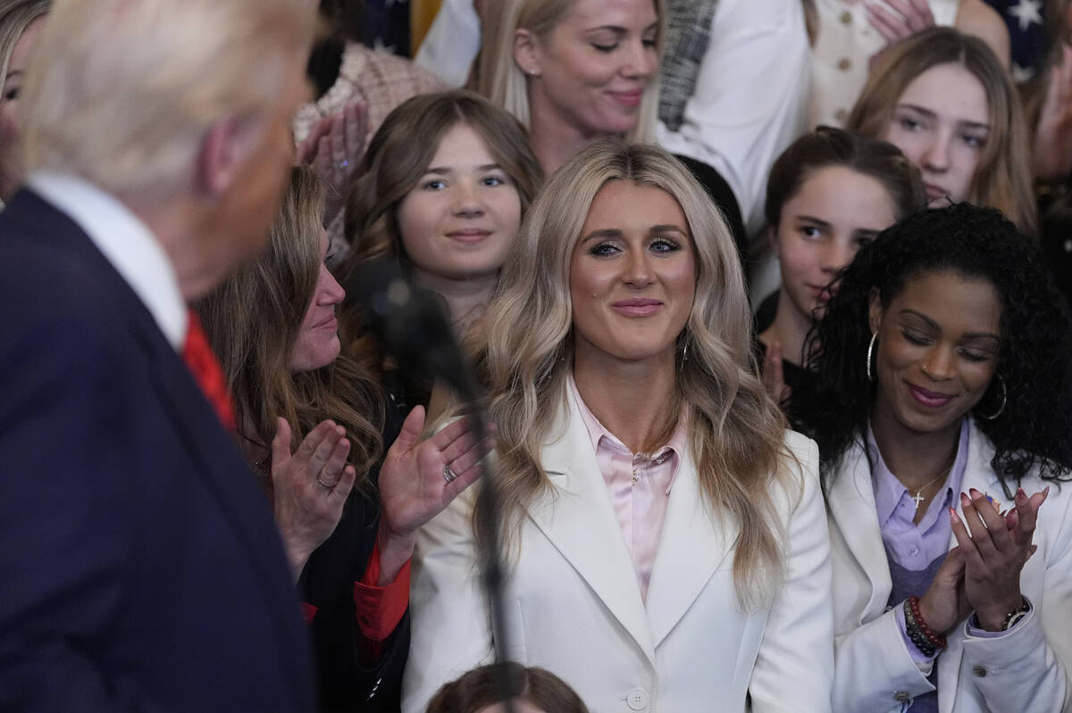President Donald Trump acknowledges Riley Gaines as he speaks before signing an executive order ...