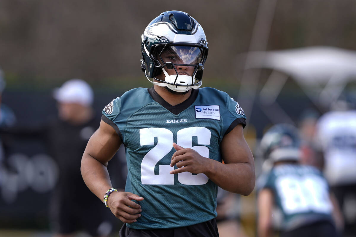 Philadelphia Eagles running back Saquon Barkley (26) runs through drills during an NFL football ...