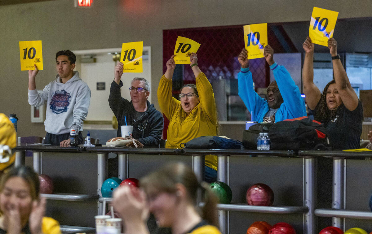 Clark fans celebrate a strike as they take on Coronado during their 5A high school girls bowlin ...