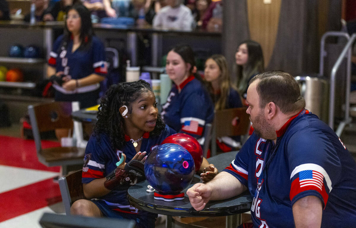 Coronado bowler Calee Berry talks strategy with head coach Nicholas Elefantis as they take on C ...