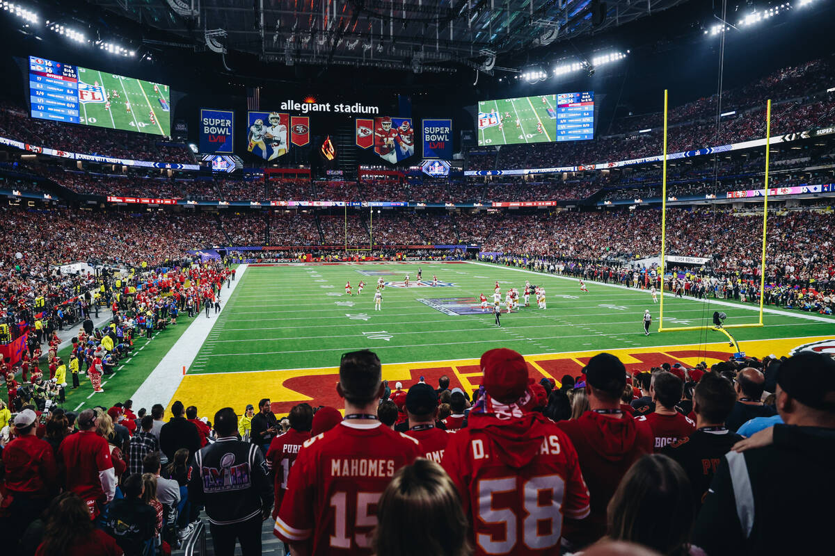 Fans watch game action during Super Bowl 58 at Allegiant Stadium on Sunday, Feb. 11, 2024, in L ...