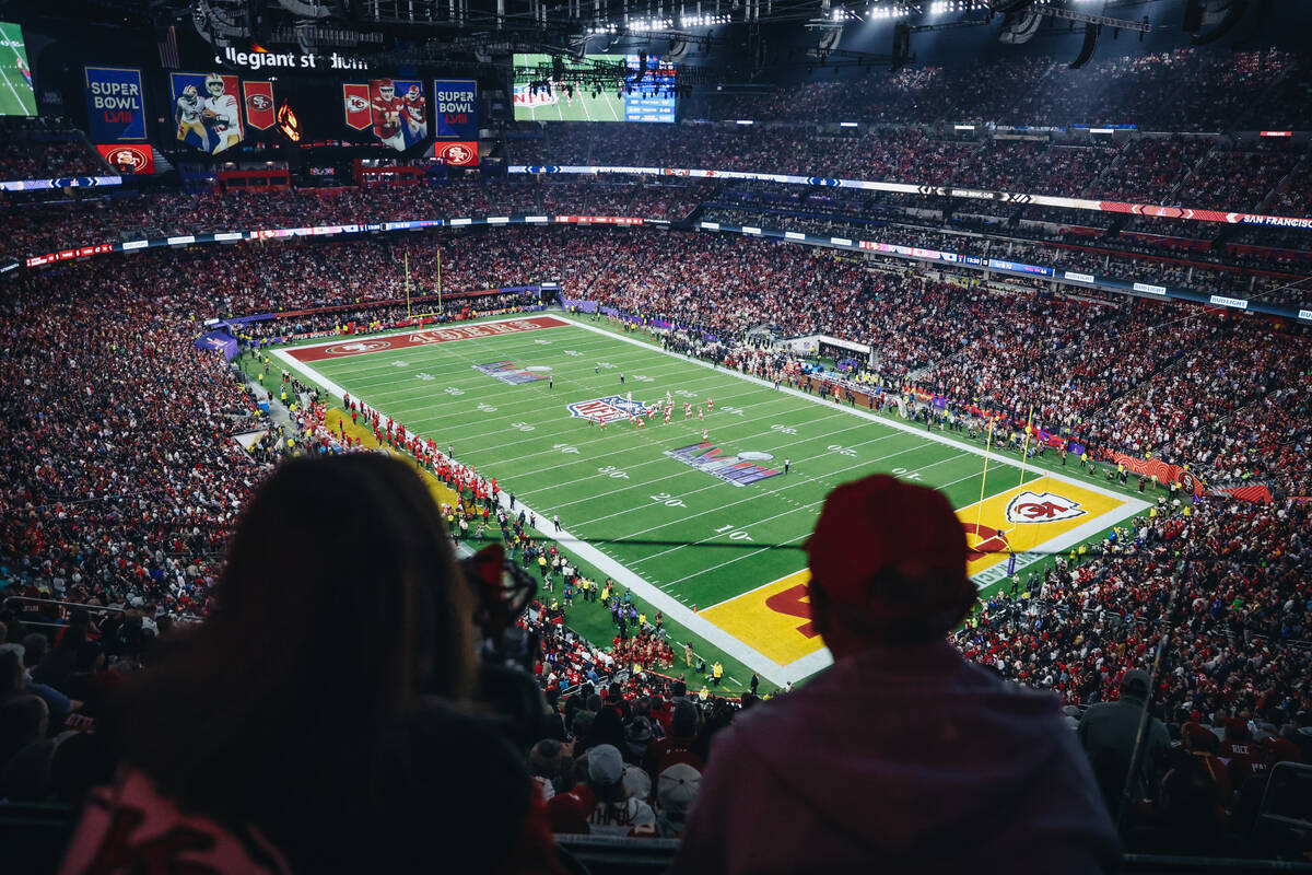 Fans watch game action during Super Bowl 58 at Allegiant Stadium on Sunday, Feb. 11, 2024, in L ...