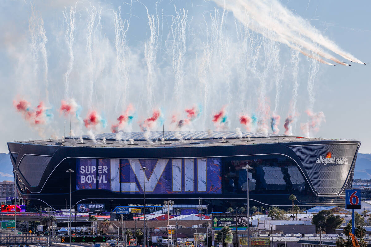 The Air Force Thunderbirds' F-16s fly over Allegiant Stadium during the kickoff of Super Bowl L ...