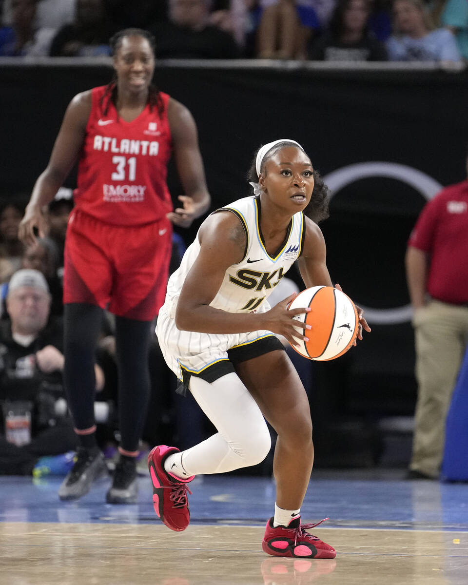 Chicago Sky's Dana Evans looks to start a fast break during a WNBA basketball game against the ...