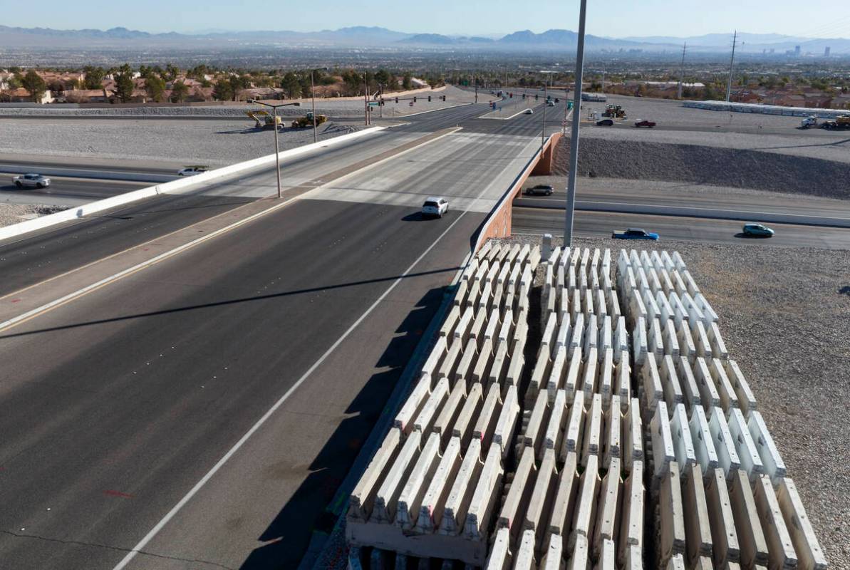 Heavy construction equipments and barriers are seen near the 215 Beltway and Summerlin Parkway, ...