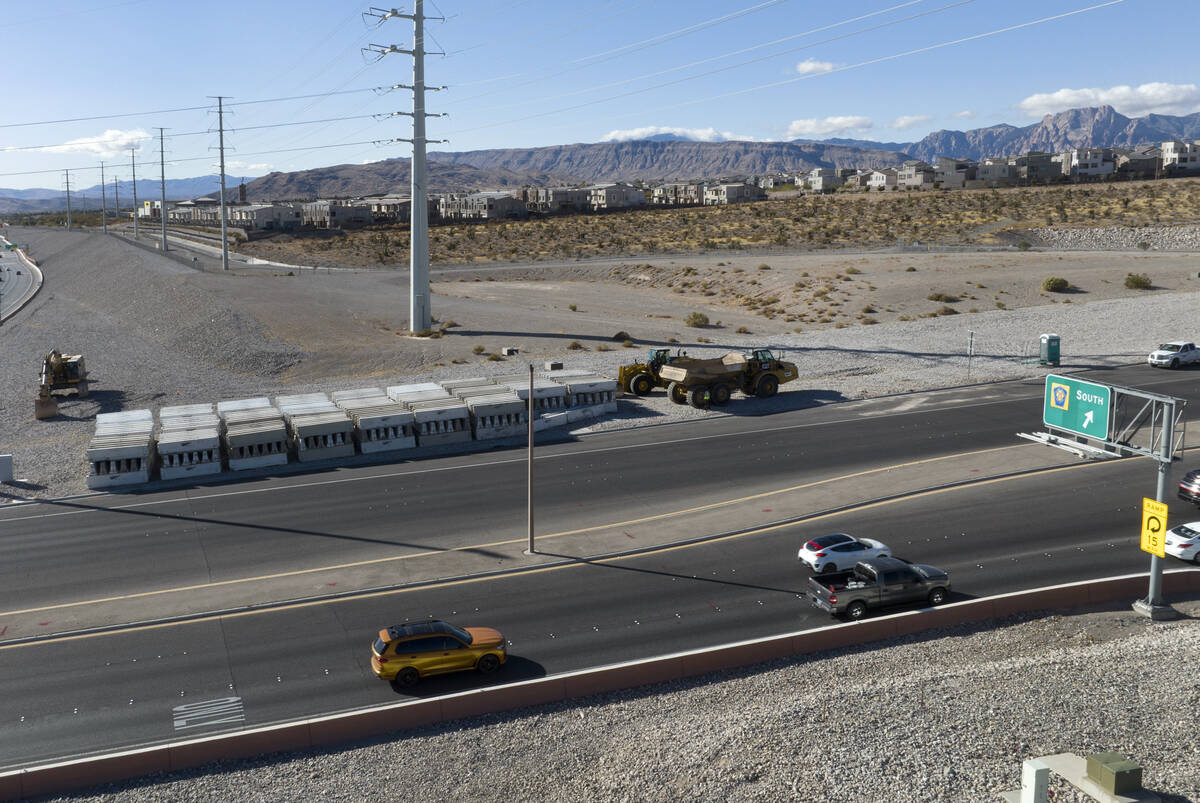 Heavy construction equipments and barriers are seen near the 215 Beltway and Summerlin Parkway, ...