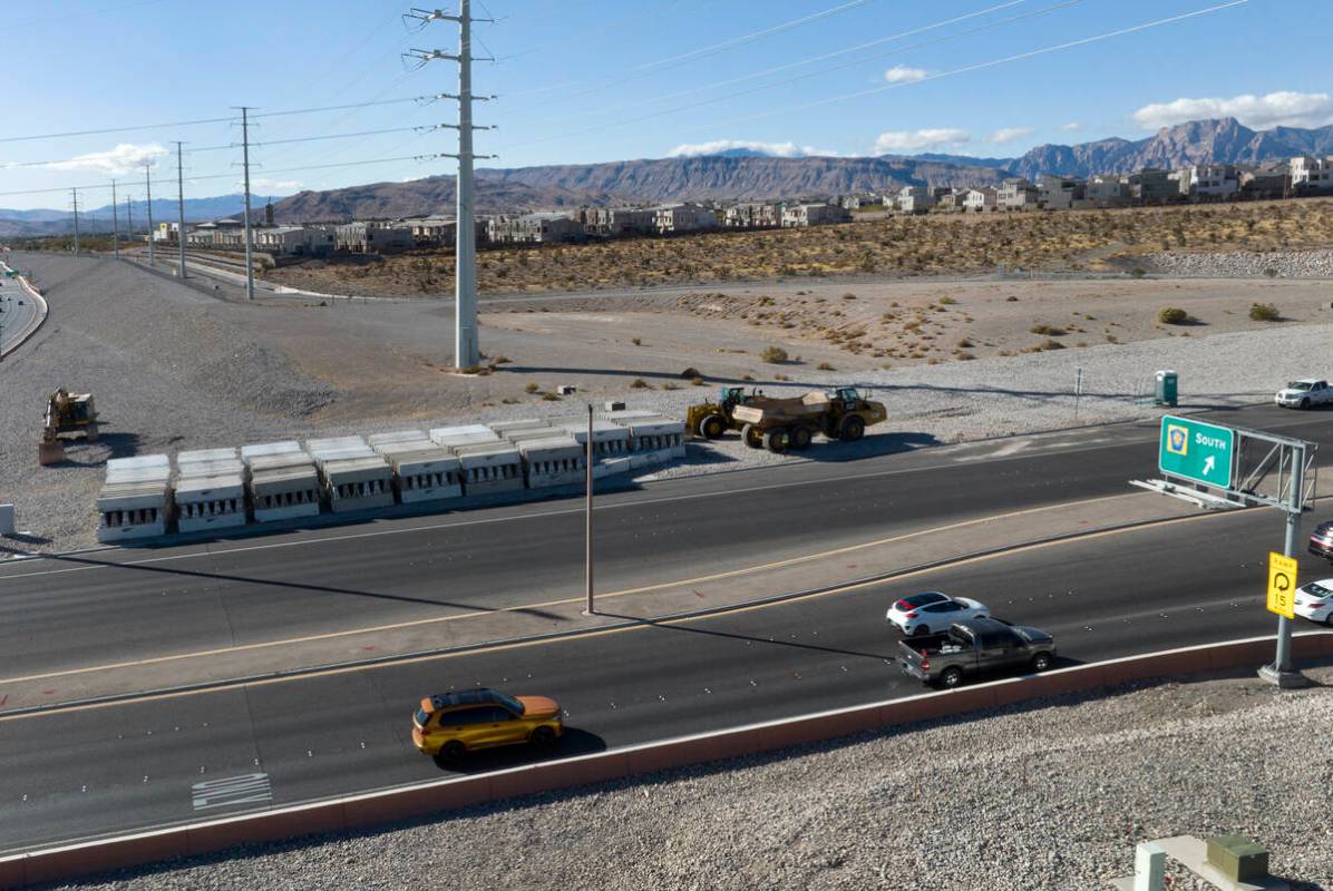 Heavy construction equipments and barriers are seen near the 215 Beltway and Summerlin Parkway, ...