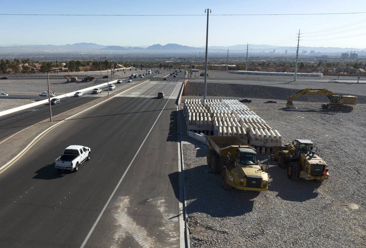Heavy construction equipments and barriers are seen near the 215 Beltway and Summerlin Parkway, ...