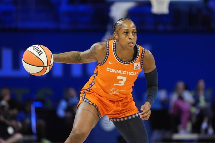 Connecticut Sun guard Tiffany Mitchell handles the ball during the second half of a WNBA basket ...