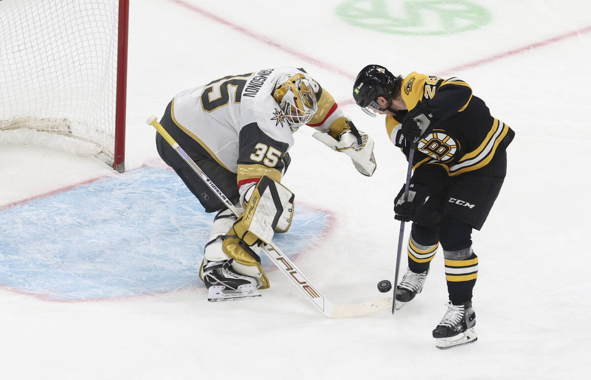 Vegas Golden Knights goaltender Ilya Samsonov (35) defends the net against Boston Bruins center ...