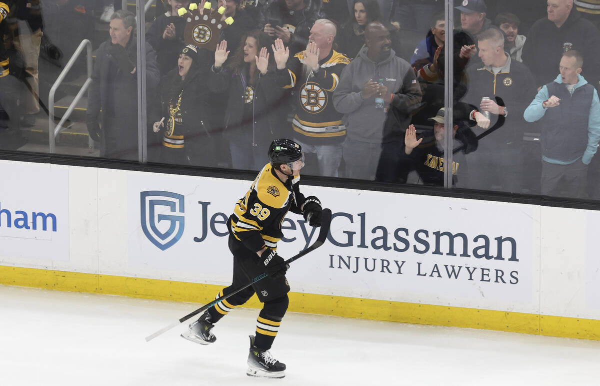 Boston Bruins center Morgan Geekie (39) skates past cheering fans after scoring during the seco ...