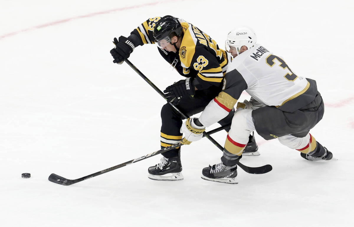 Boston Bruins left wing Brad Marchand (63) and Vegas Golden Knights defenseman Brayden McNabb ( ...