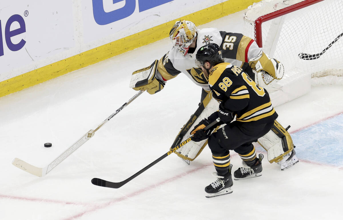 Vegas Golden Knights goaltender Ilya Samsonov (35) defends the net against Boston Bruins right ...