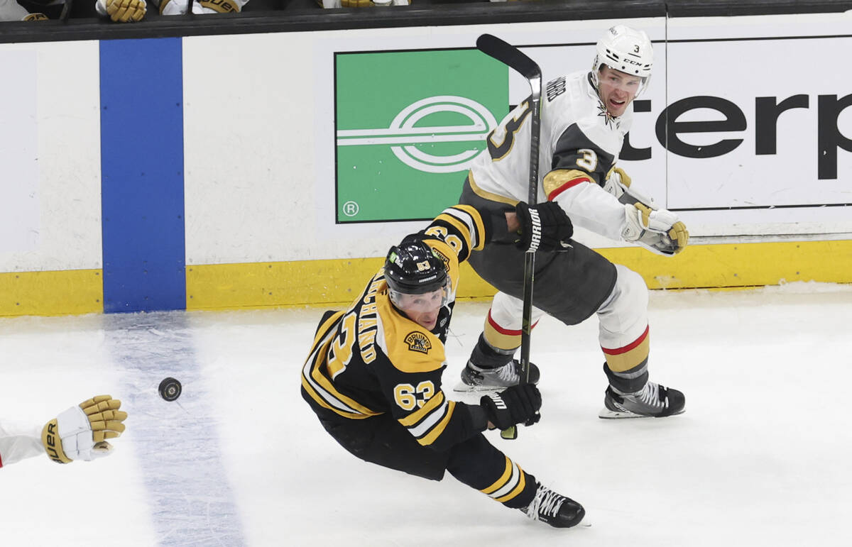 Boston Bruins left wing Brad Marchand (63) and Vegas Golden Knights defenseman Brayden McNabb ( ...