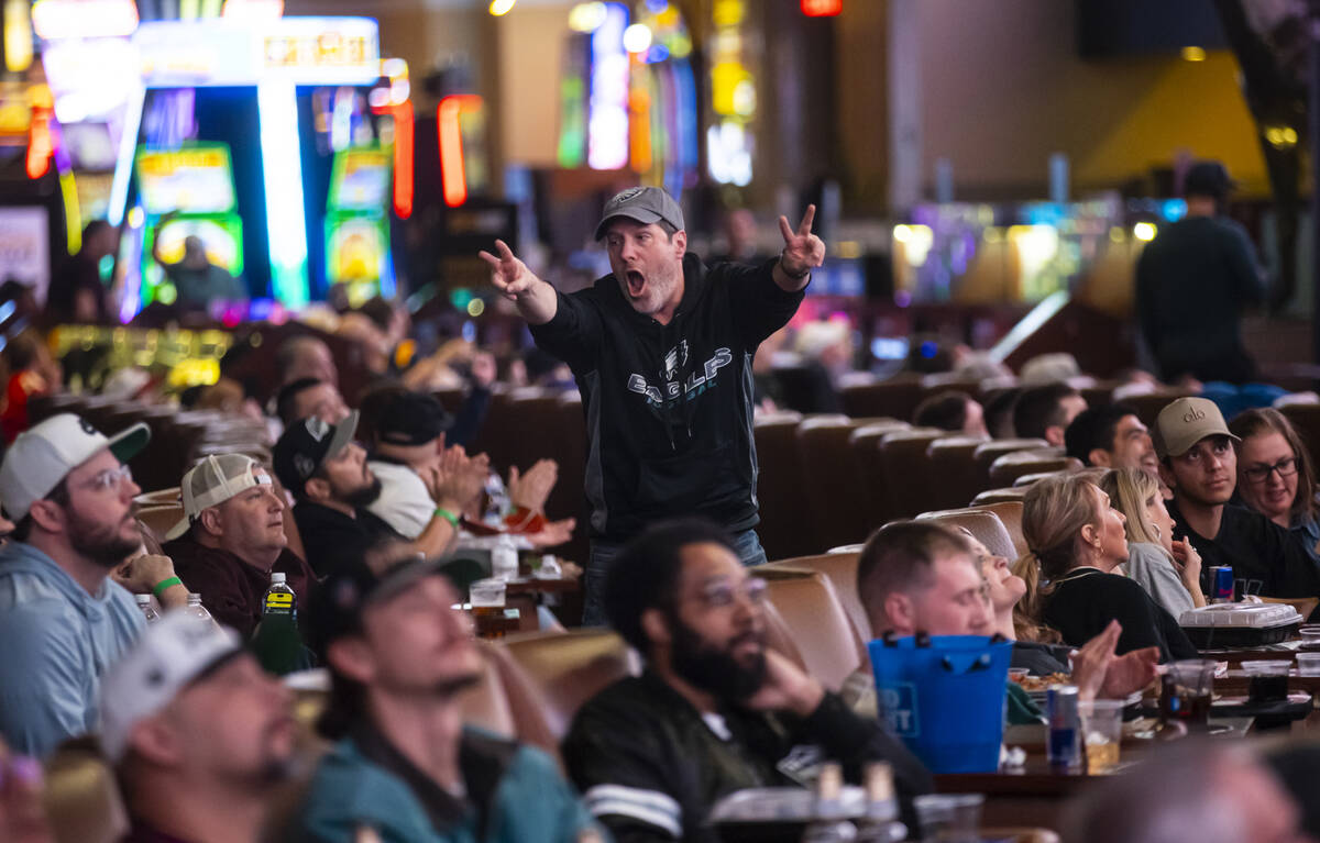 A Philadelphia Eagles fan celebrates after Kansas City Chiefs quarterback Patrick Mahomes was s ...