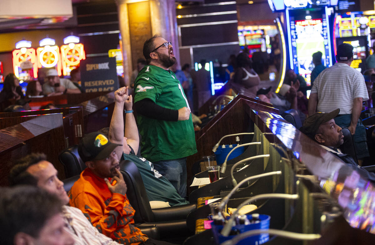A Philadelphia Eagles fan cheers as the team takes on the Kansas City Chiefs in Super Bowl 59 w ...