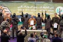 Israeli captives, from left to the right, Ohad Ben Ami, Eli Sharabi and Or Levy, who have been ...