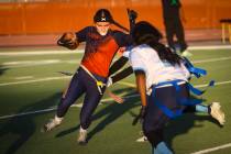 Legacy's Larissa Lotta (5) gets tagged out by Canyon Springs during a 4A state playoff flag foo ...