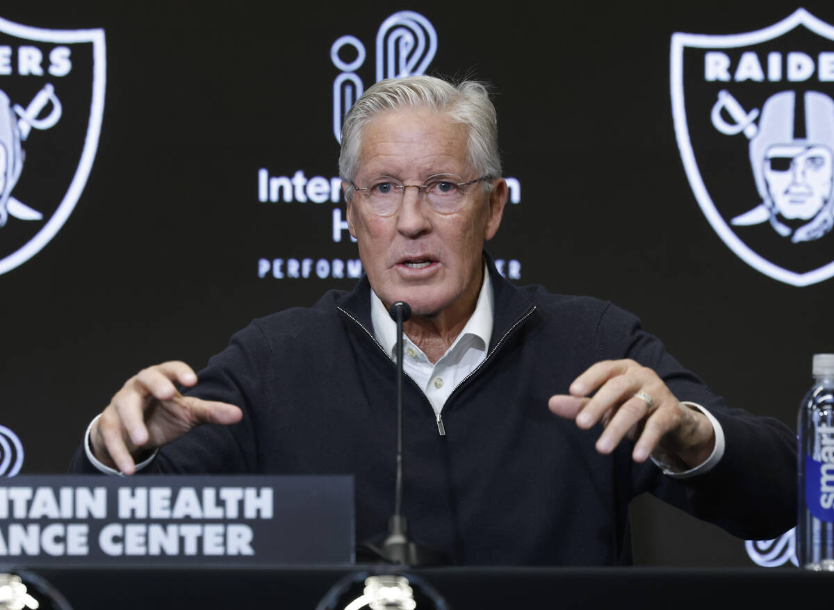 Pete Carroll speaks after being introduced as the new Raiders head coach during a press confere ...