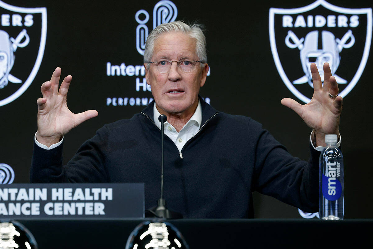 Pete Carroll speaks after being introduced as the new Raiders head coach during a press confere ...