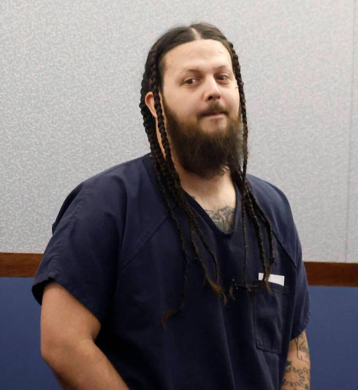 Christian Scarlett appears in court during a hearing at the Regional Justice Center, on Tuesday ...
