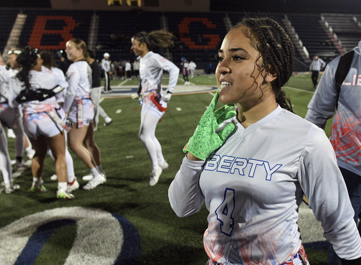 Liberty’s Ki'lolo Westerlund pulls off her gloves after the 5A flag football state quarterfin ...