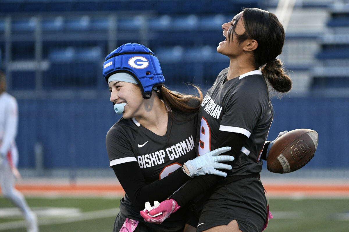 Bishop Gorman’s Adeline Flanagan, left, and Preseah Williams celebrate Flanagan’s ...