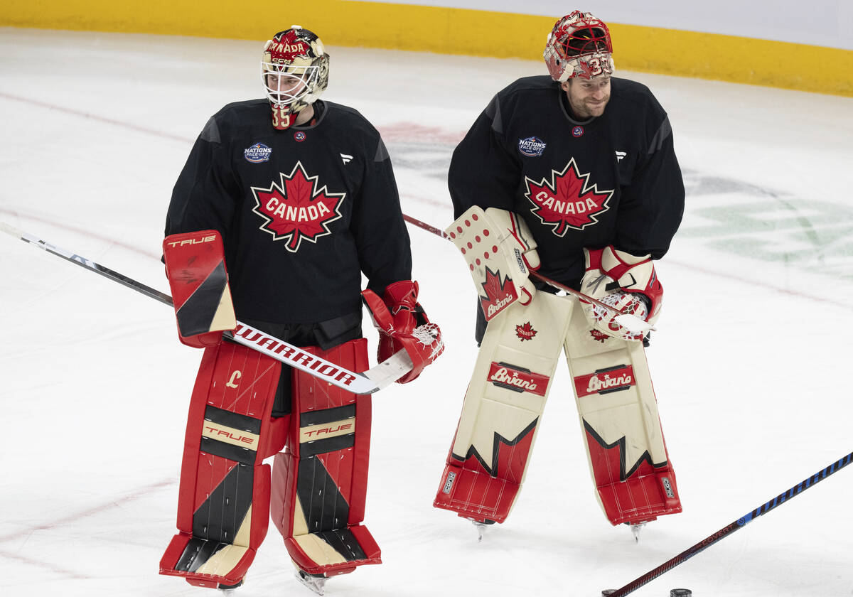 Canada goaltenders Sam Montembeault, left and Adin Hill skate during practice for the 4 Nations ...
